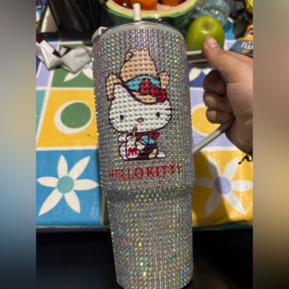 Hello Kitty Silver and Red Bird Toy